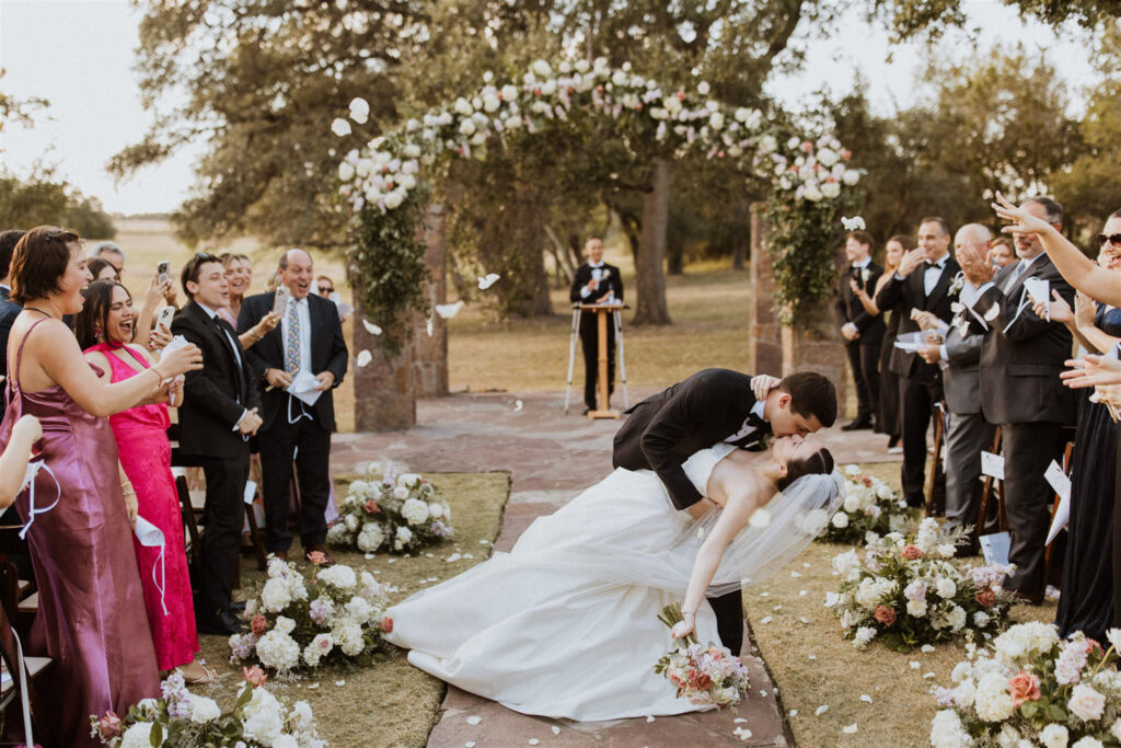 Dramatic wedding dip with floral accents