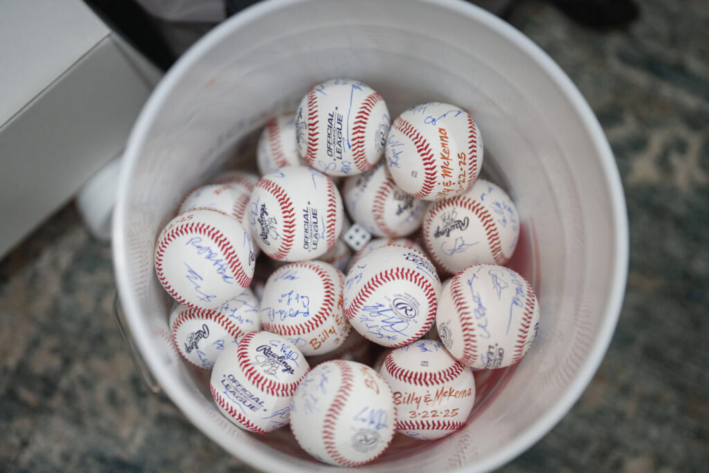 Signed baseball guestbook idea reflecting 2026 wedding trends in personalization