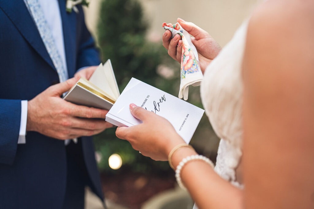 An emotional close-up of a couple exchanging personalized wedding vows at Ma Maison, an Austin Wedding venue