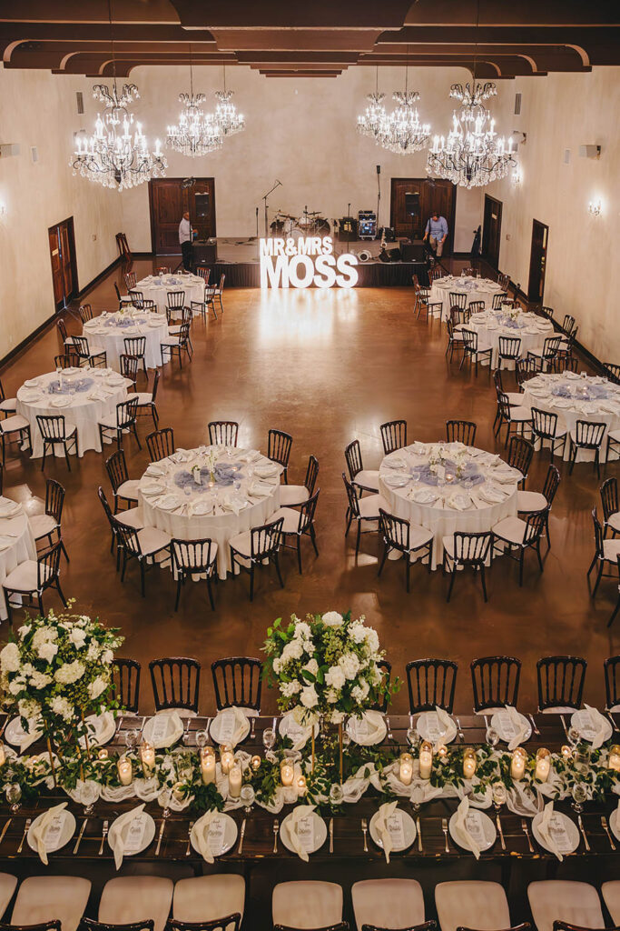 Spacious ballroom at an Austin wedding venue set up for a luxury wedding reception