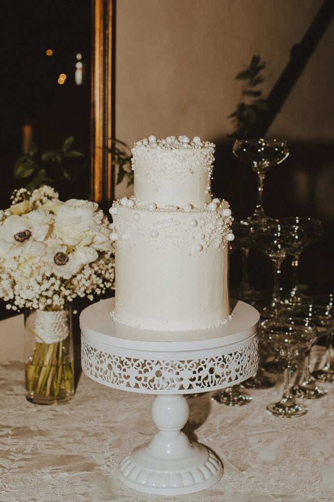 wedding cake with pearls at Ma Maison reception