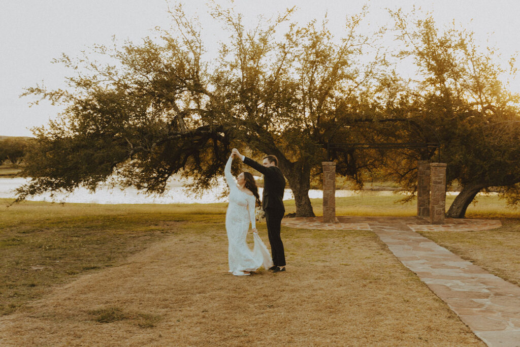 bride and groom dancing at wedding