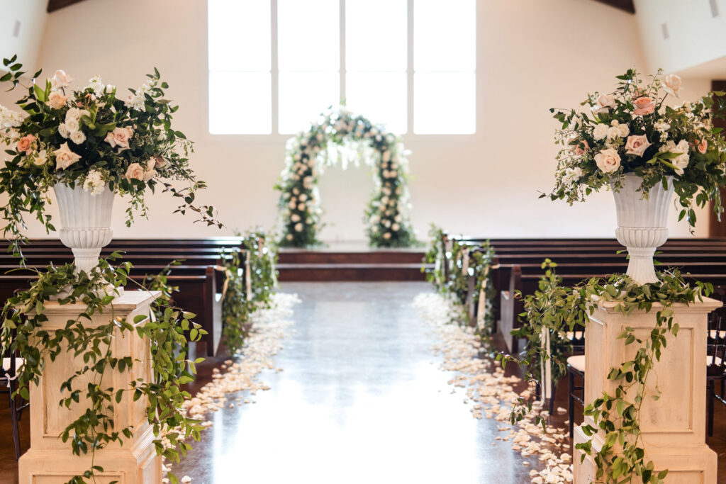 A grand indoor wedding space at Ma Maison, perfect rain-proof wedding venue in the Texas Hill Country, combining luxury with natural beauty for a dreamy indoor ceremony