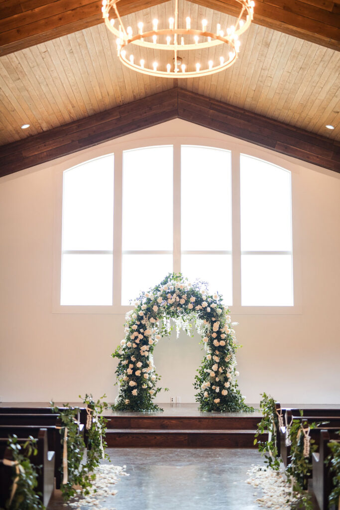 The Chapel for a rainy wedding day adorned with florals