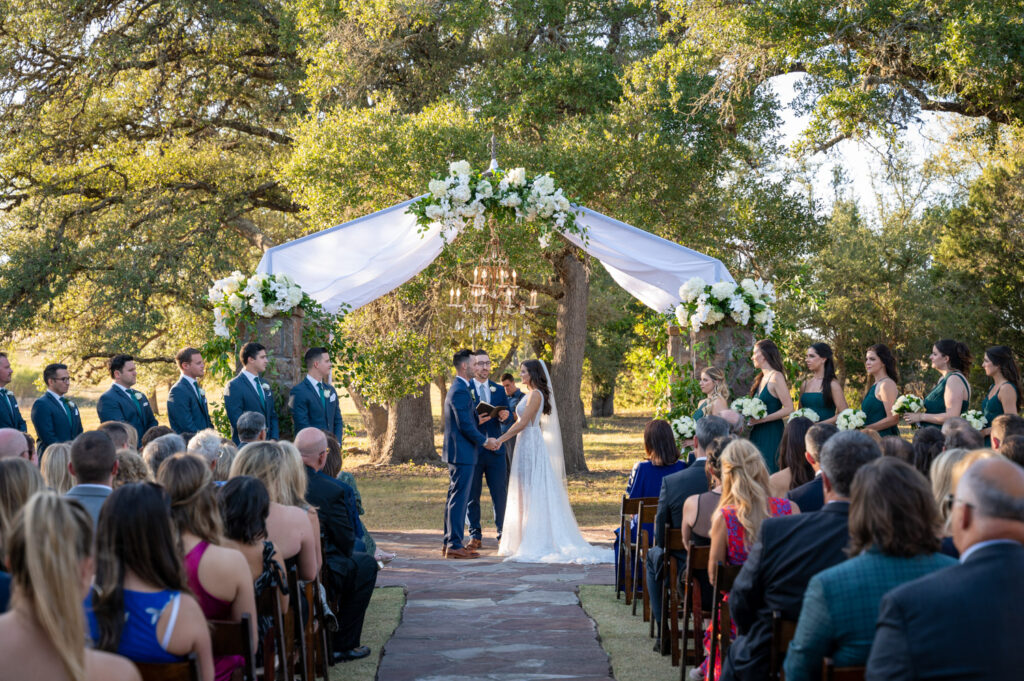 Outdoor ceremony vows with bridal party at the Best Non-Barn Wedding Venues