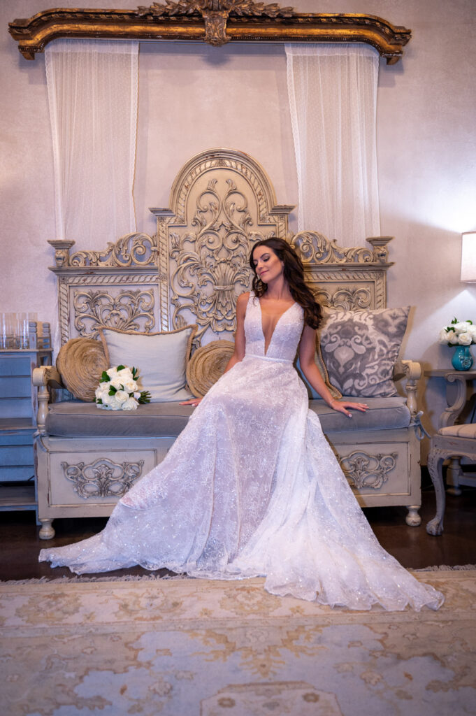 Bride sitting in elegant bridal suite