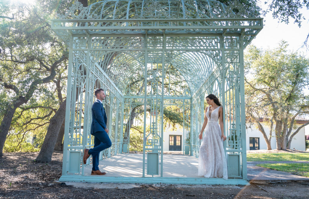 Bride and groom at outdoor iron gazebo at the Best Non-Barn Wedding Venues