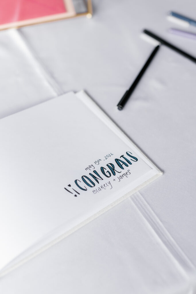 Wedding guest book with handwritten congratulations