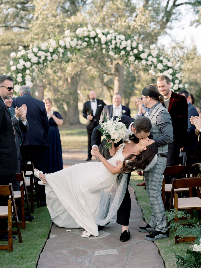 Bride and groom kiss after ceremony