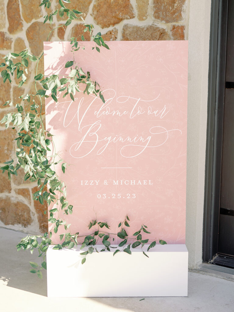 pastel pink welcome sign for spring wedding