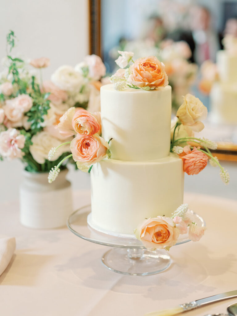 wedding cake with florals at wedding reception