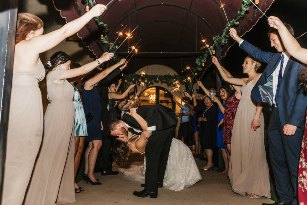 couple's sparkler exit on their Texas wedding day
