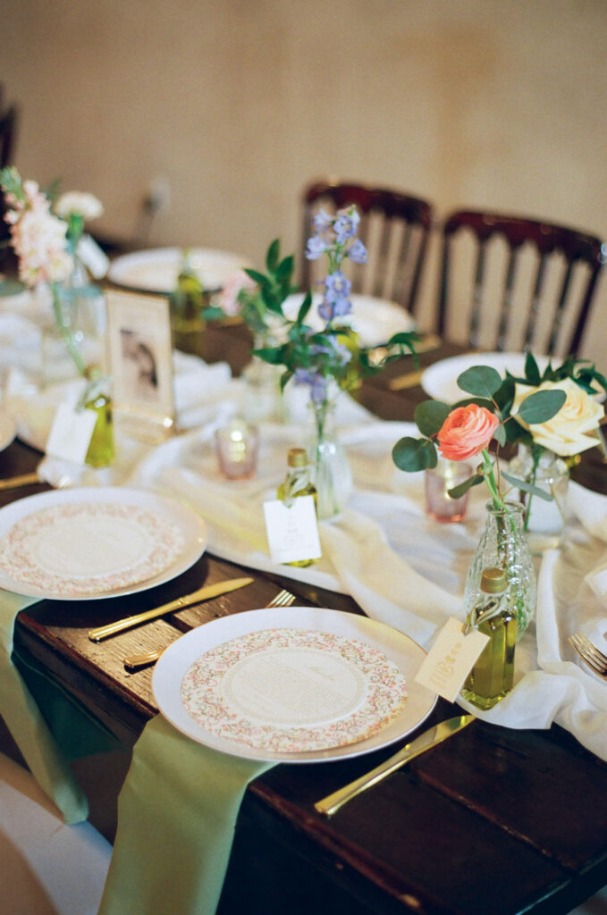 tableware and tablescape set up with olive oil at Ma Maison, a wedding venue in TX