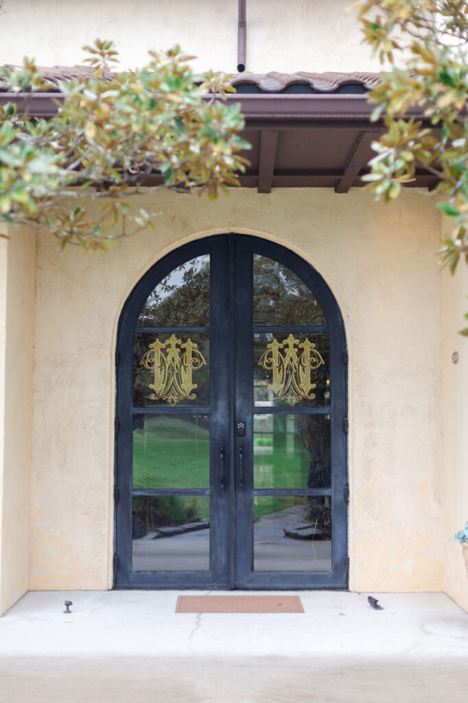 black French doors entrance to Ma Maison, a wedding venue in TX
