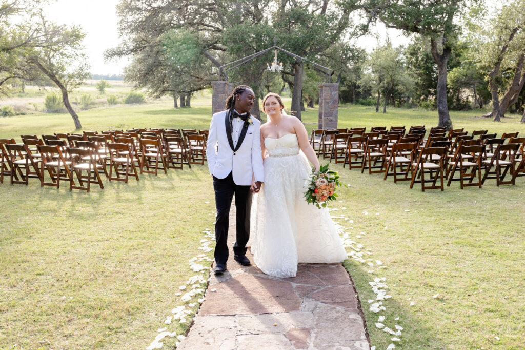 bride and groom walking back down aisle