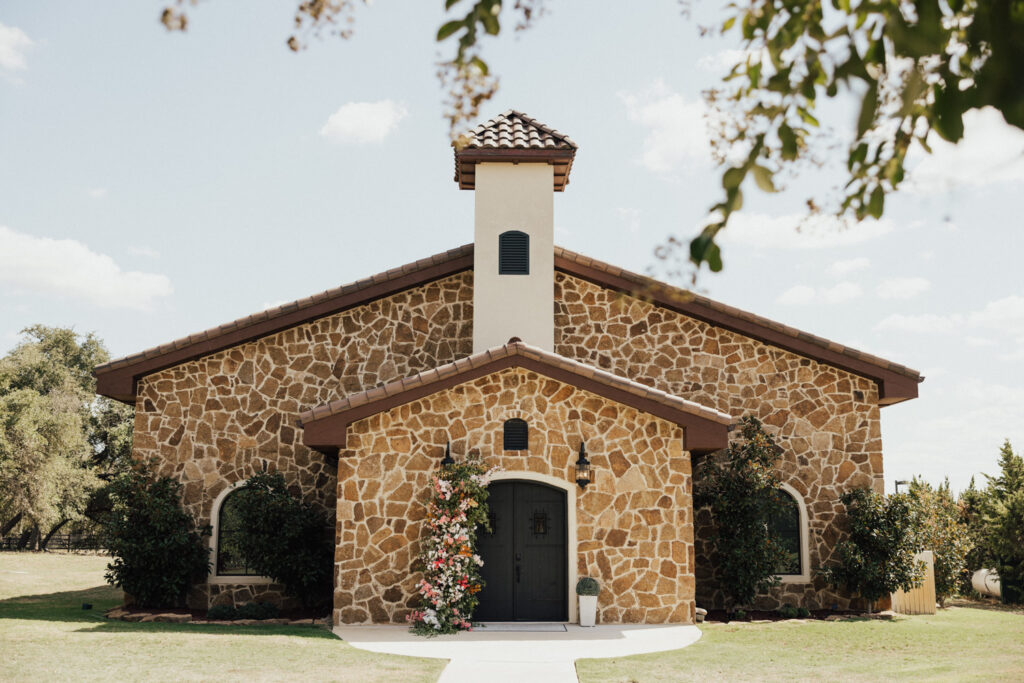 Stone chapel exterior at non barn wedding venue in Austin