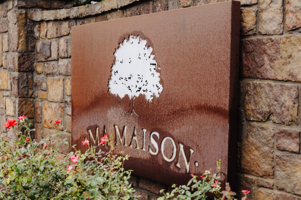 Rustic Ma Maison entrance sign, a top-rated wedding venue near Houston