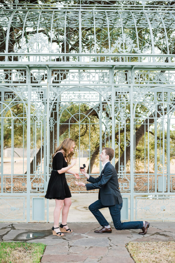 Intimate proposal with groom kneeling at iconic Ma Maison location