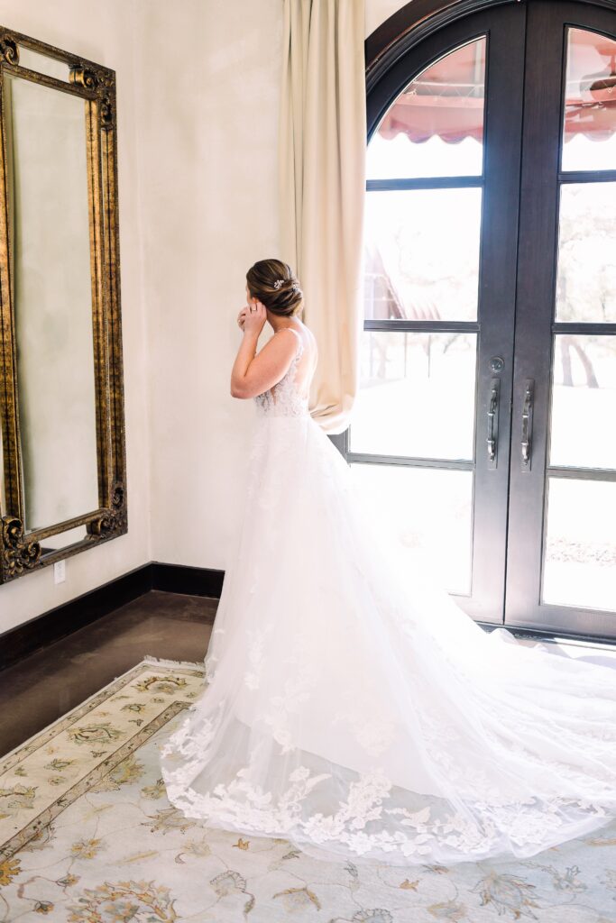 bride gets ready for her wedding in Dripping Springs