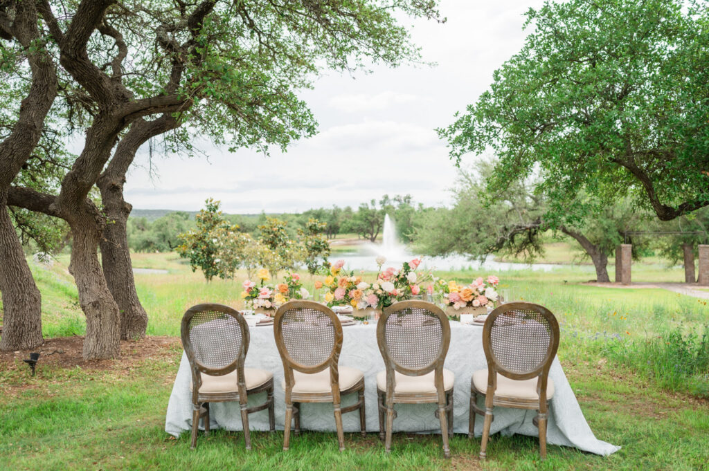 Outdoor wedding table setup overlooking the Ma Maison grounds