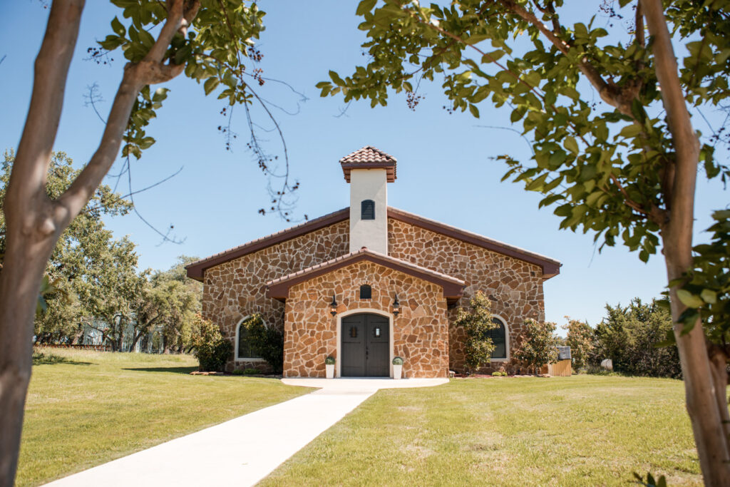 Scenic chapel exterior at Ma Maison wedding venue on a sunny day