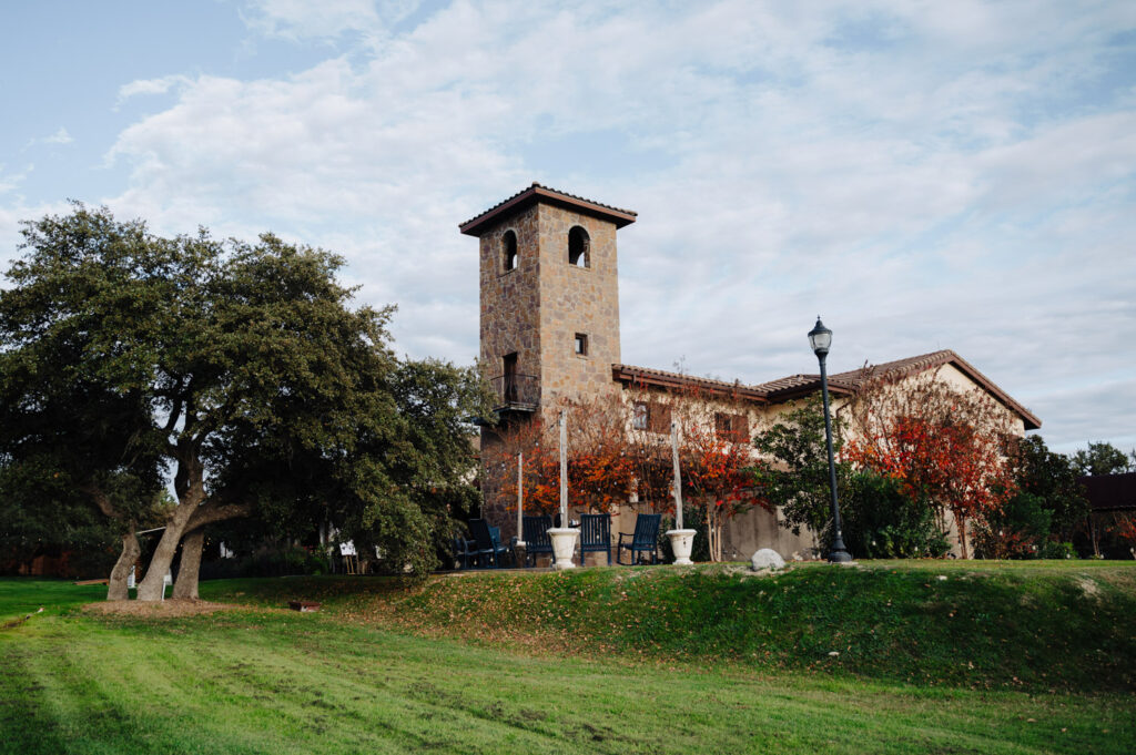Fall foliage surrounding Ma Maison’s stone tower