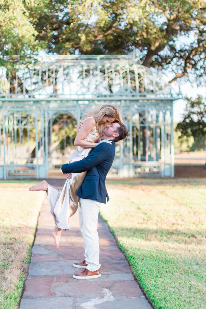 Bride and groom celebrating their wedding at Ma Maison, a romantic Texas Hill Country wedding venue.