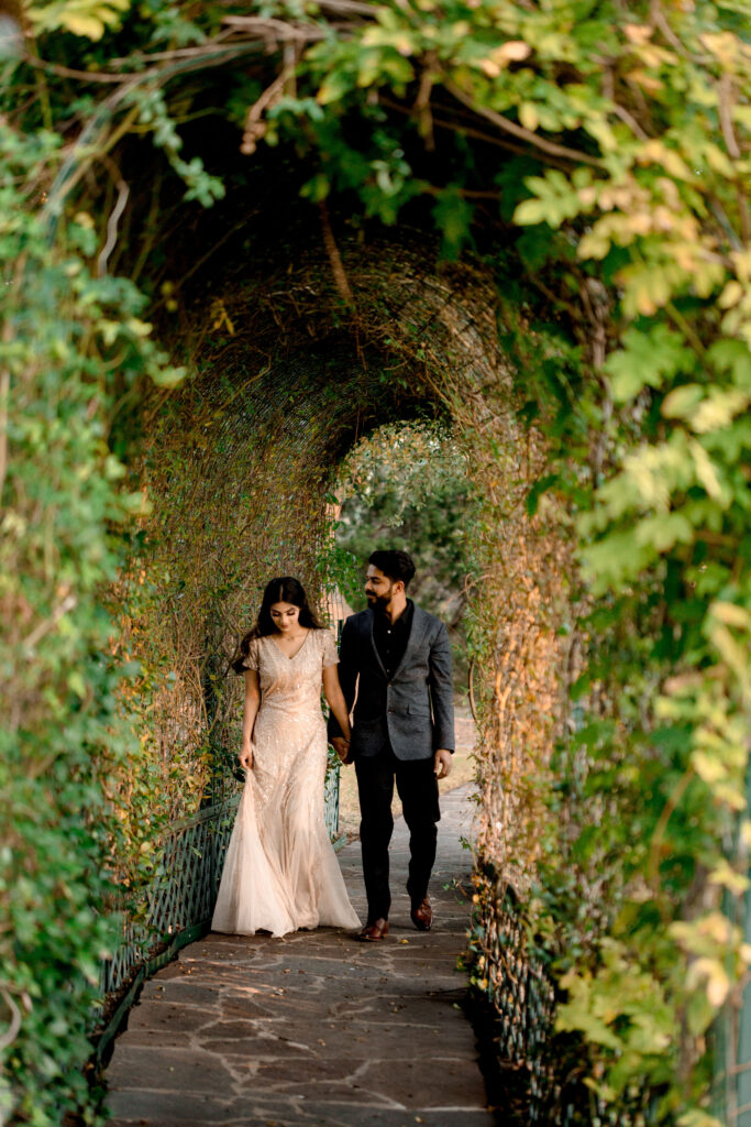 Tunnel of love, engagaements, she said yes. European-inspired wedding venue in Dripping Springs, Ma Maison, showcasing its timeless charm.