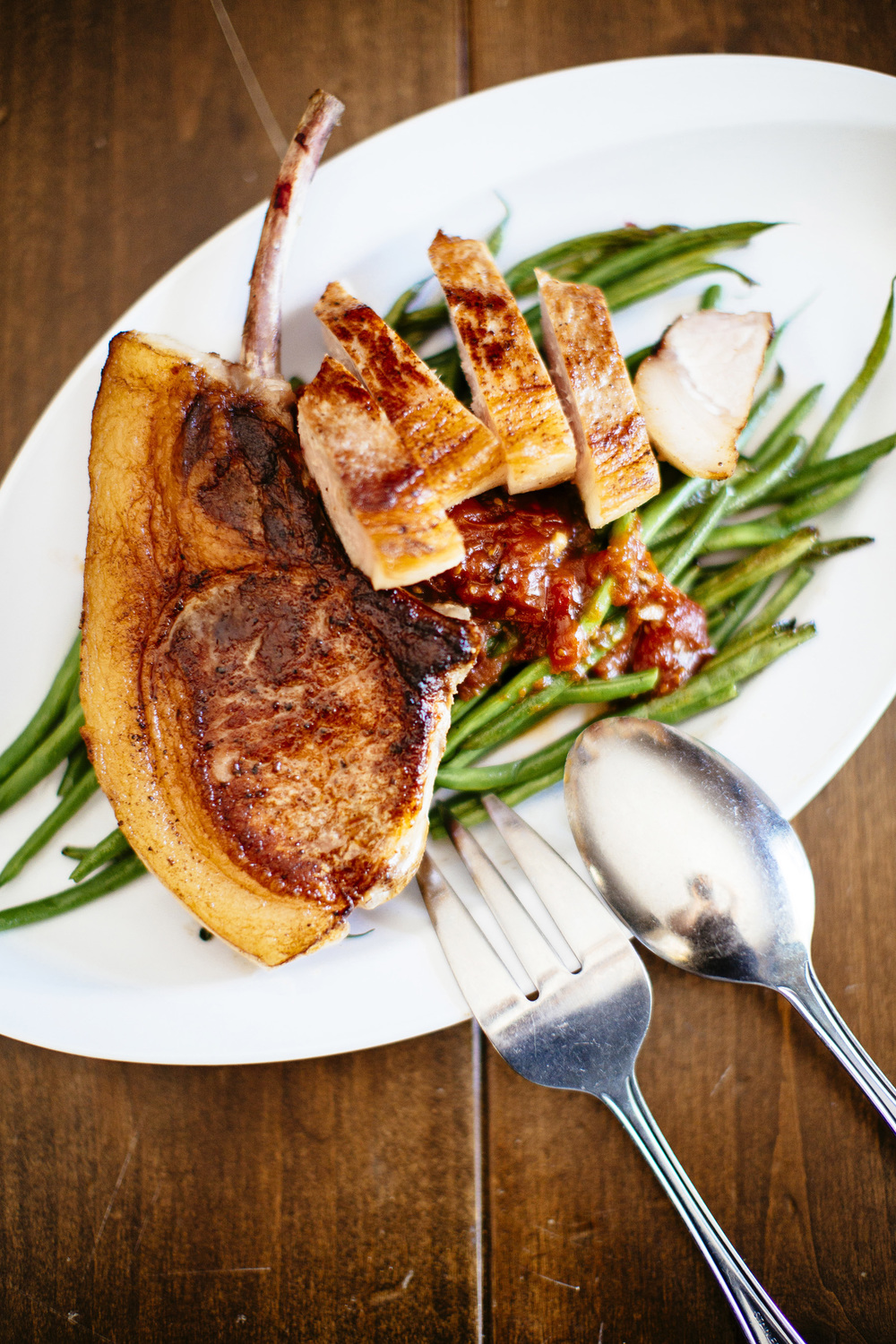 Seared and Sous Vide Pork Chop with Green Beans and Tomato