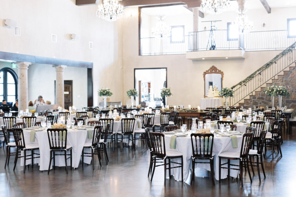 Elegant reception setup with chandeliers showing intimate wedding venues near Austin