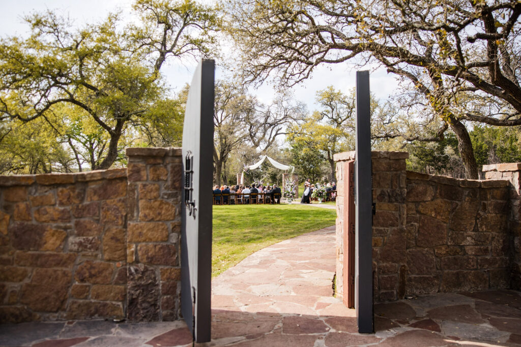 Ceremony view through stone gates