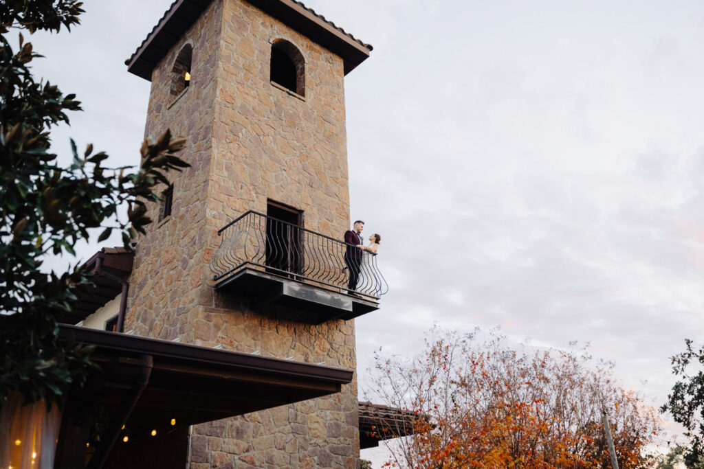 Couple on balcony at Ma Maison