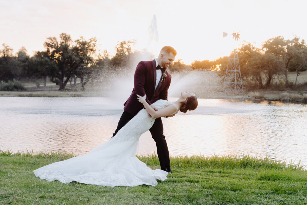 Sunset dip by lake captured by a wedding videographer in Austin