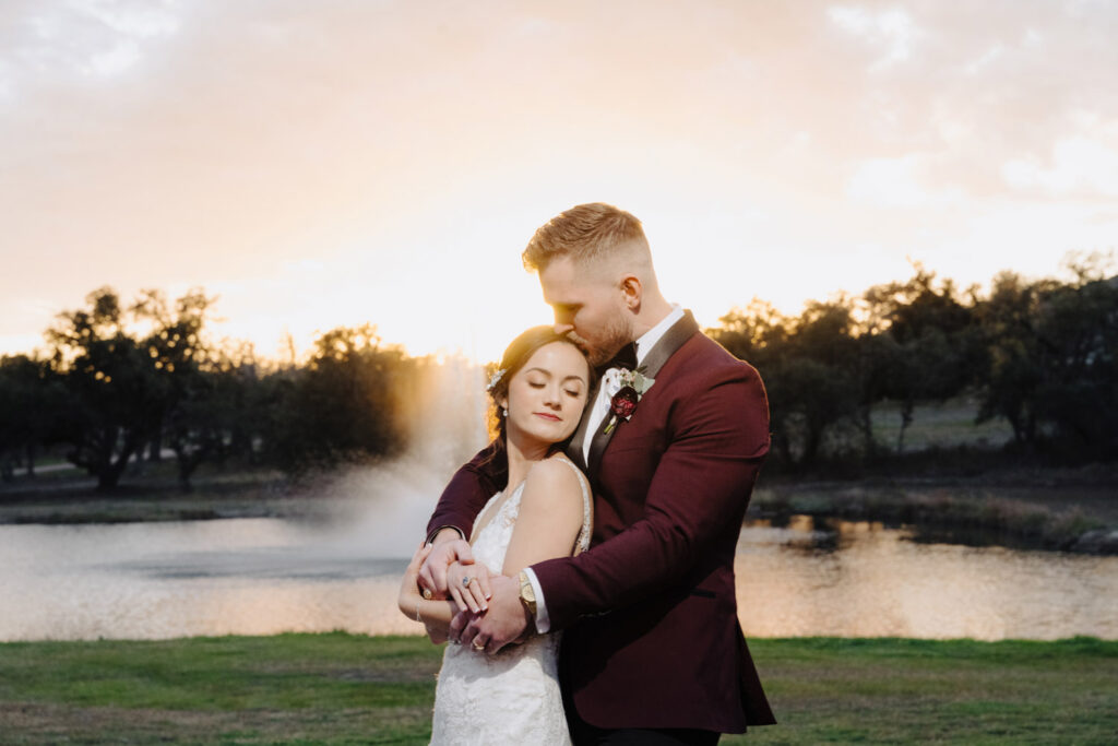 Tender sunset embrace by the lake