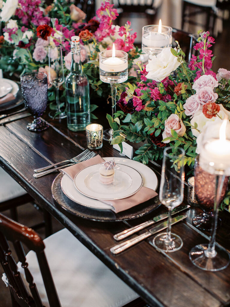 Elegant place setting with candles and florals