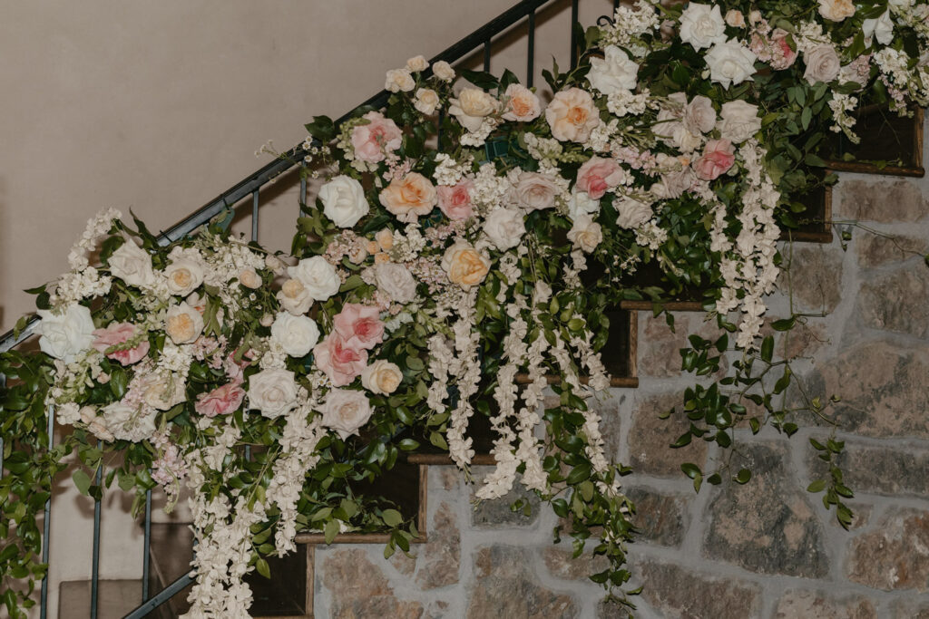 Staircase flowers with dense roses showing bulk blooms
